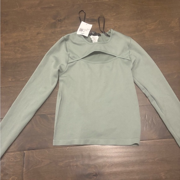 Forever 21 Tops - Never worn! Side small green top from forever 21